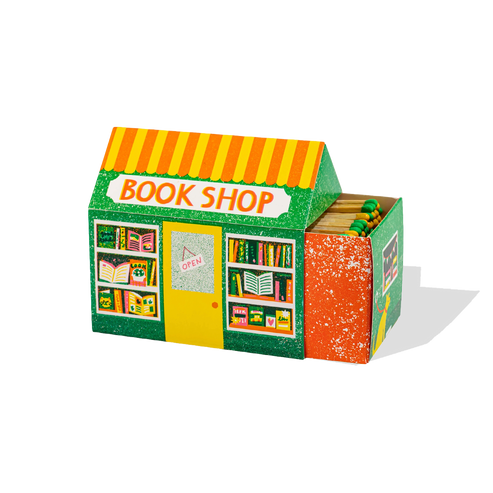Colorful toy bookshop with books and a striped roof on a white background