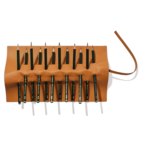 Brown leather pencil holder with multiple pencils on a white background