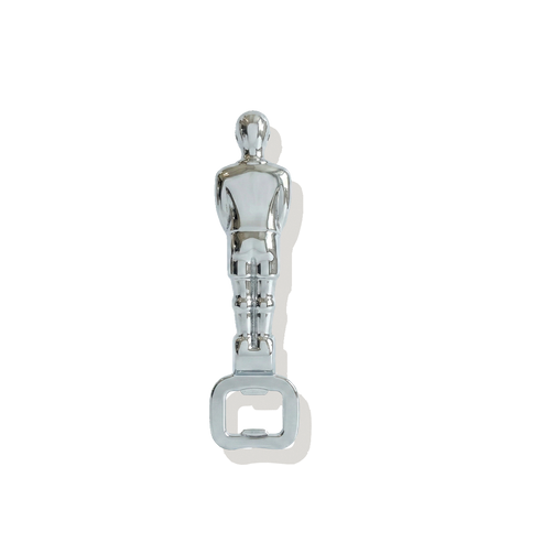 Metal bottle opener shaped like a person on a white background