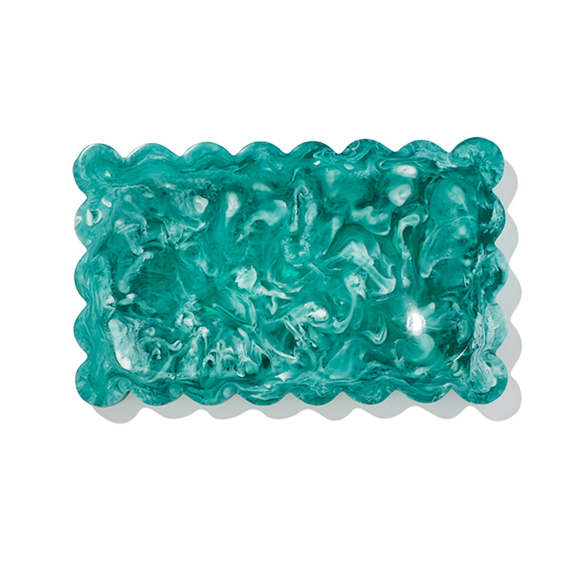 Turquoise-colored jelly candy on a white background
